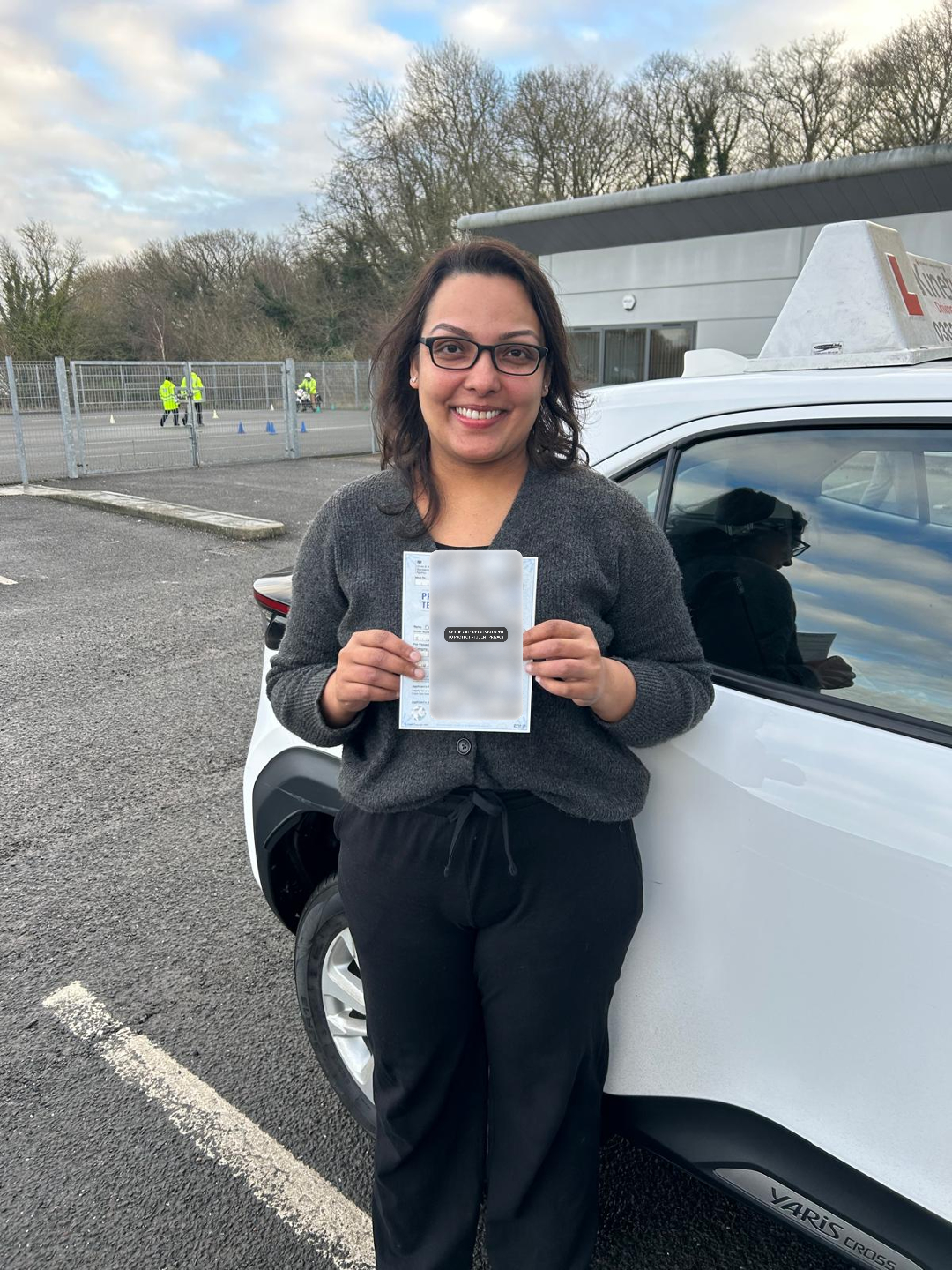A learner holding a privacy-protected practical driving test certificate